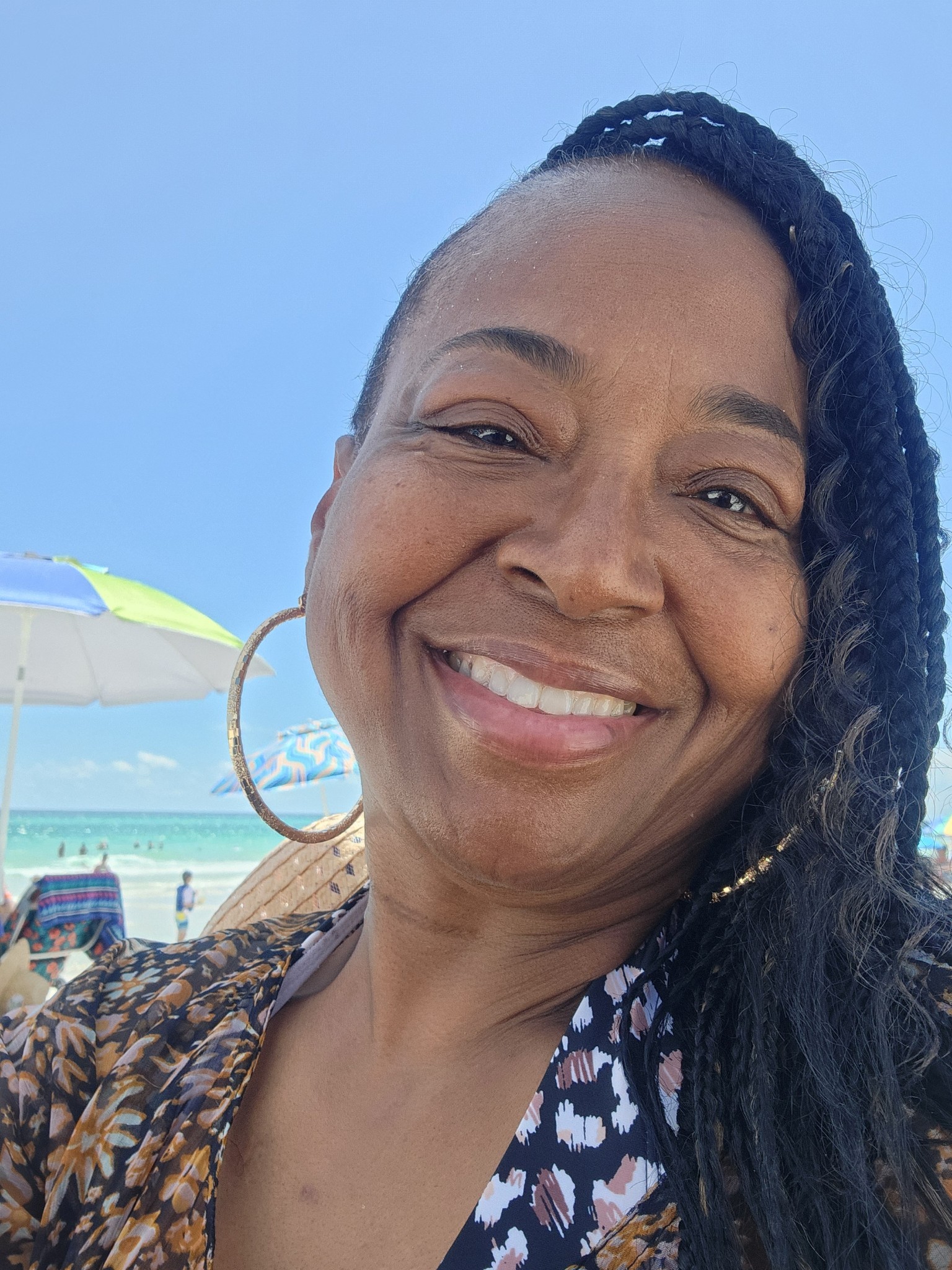 Portrait photo of a woman at the beach.